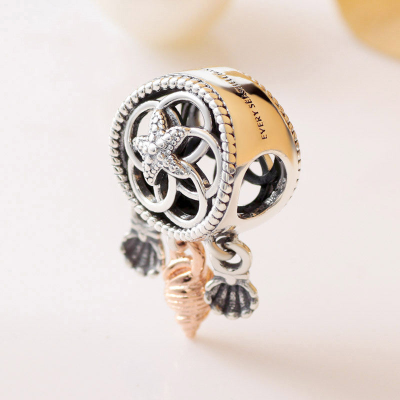 Hollow shell dream catcher charm