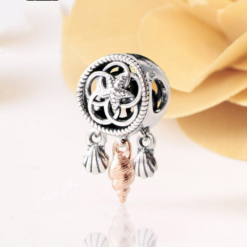 Hollow shell dream catcher charm