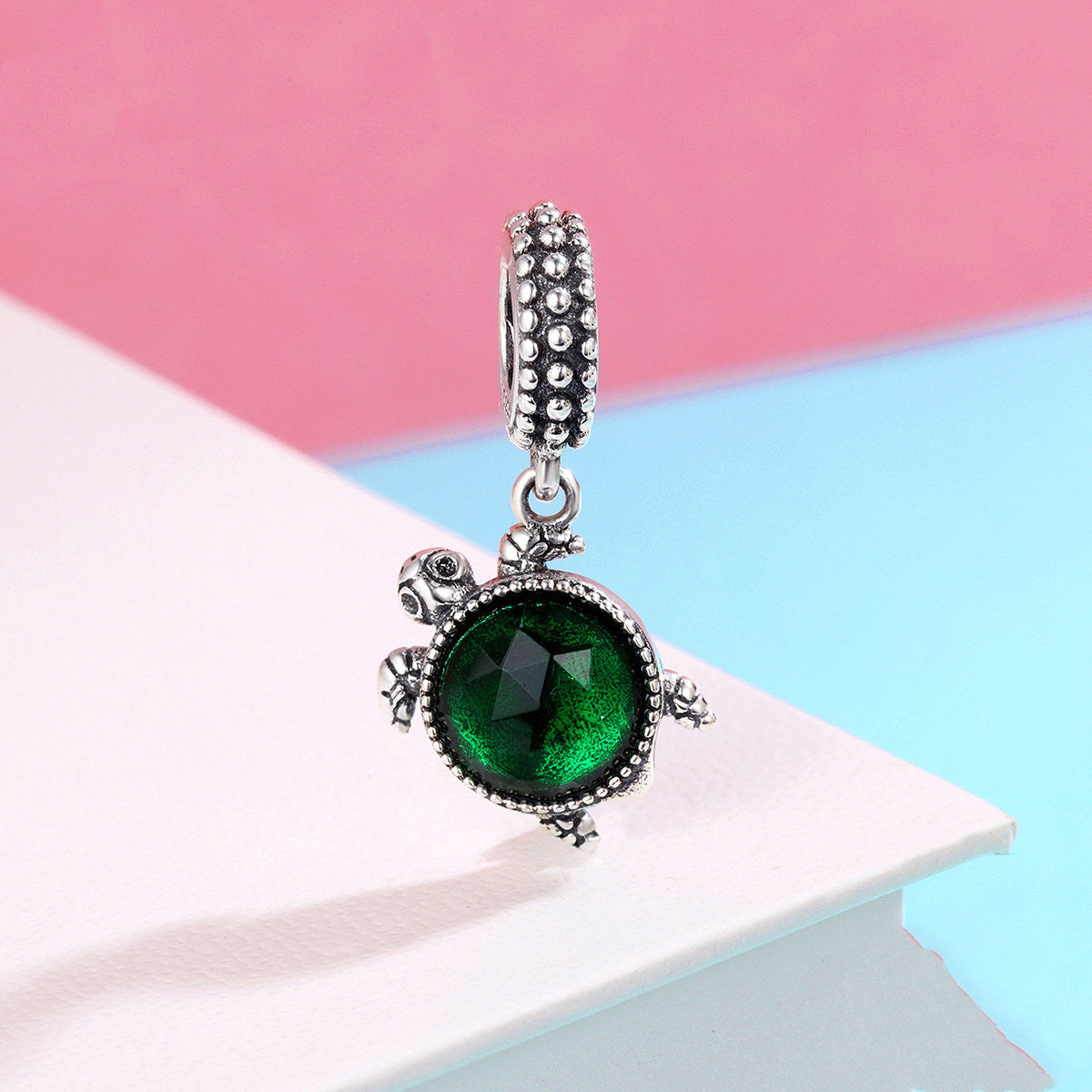 Turtle inlaid green crystal charm