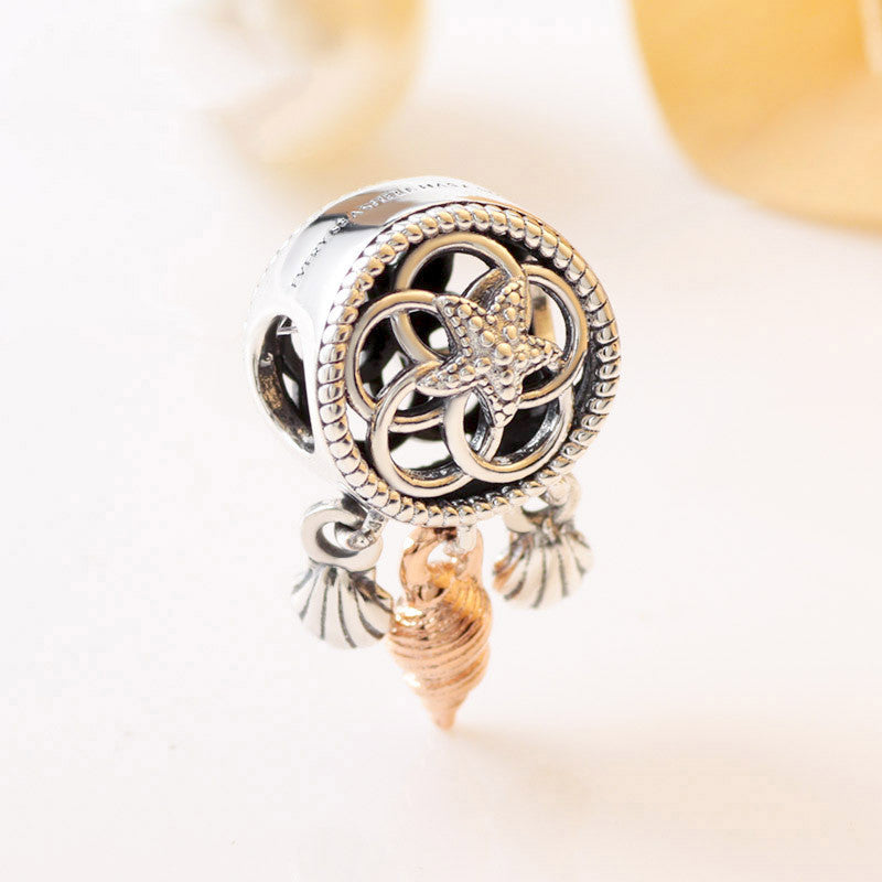 Hollow shell dream catcher charm